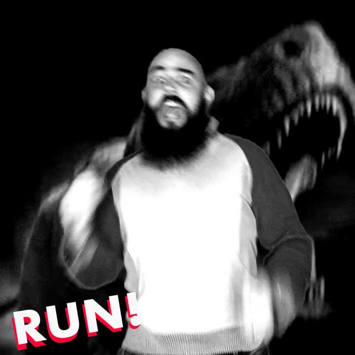 man running from t-rex gif