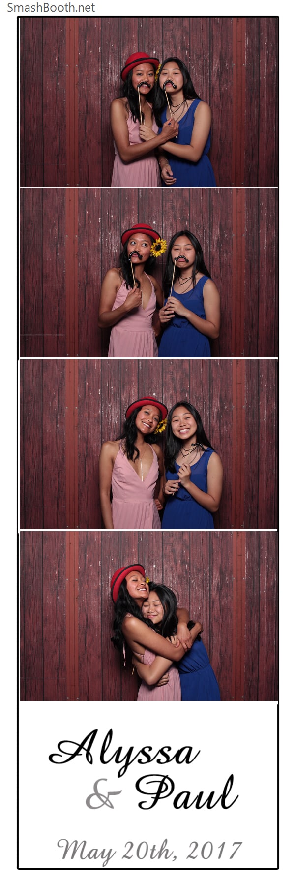2x6 photo strip of two girls posing in front of wood fence backdrop