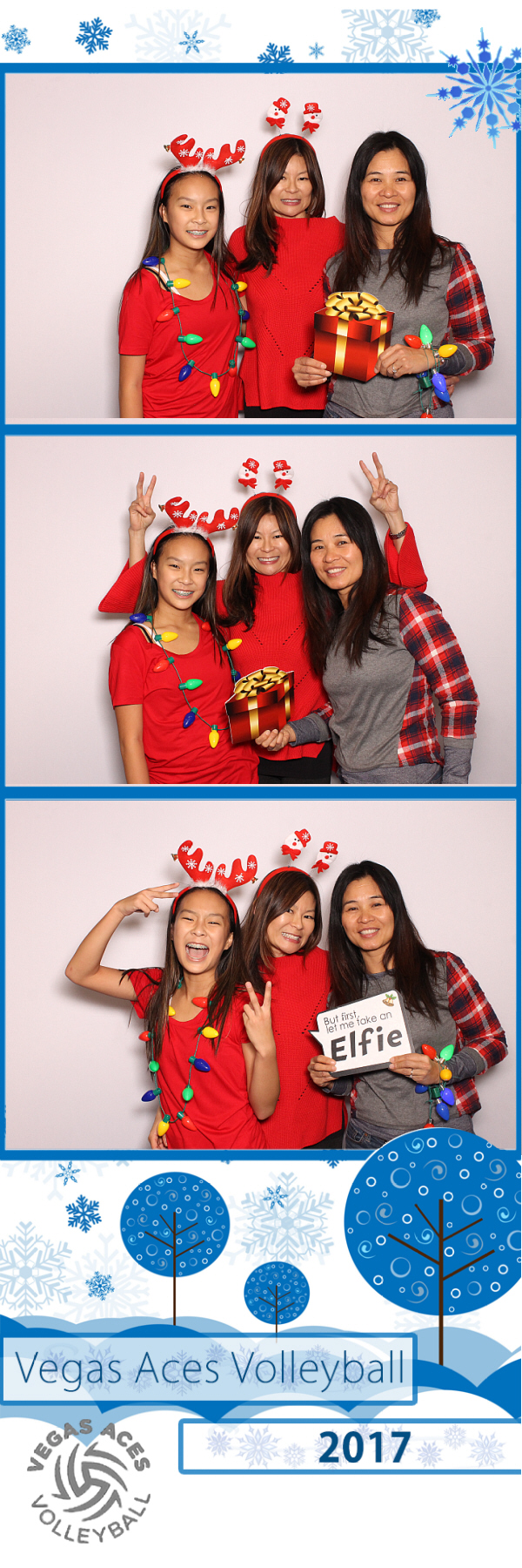 2x6 photo strip with three women posing with props and white backdrop