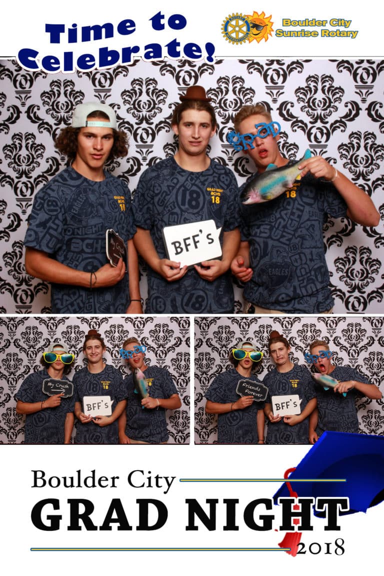 4x6 photo strip of group posing with props and damask backdrop