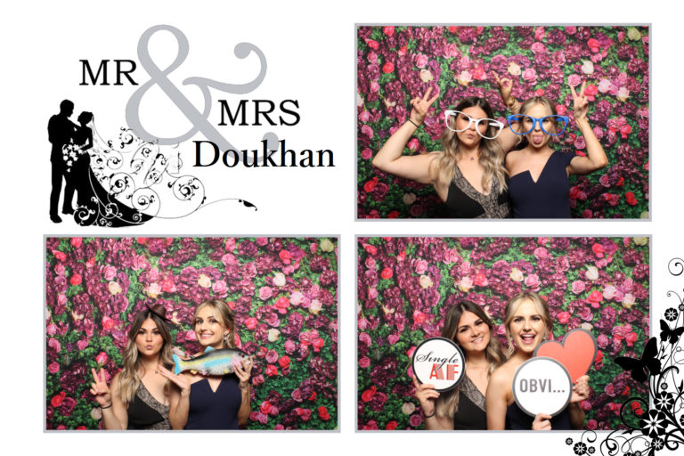 4x6 photo strip two women posing with props and rose wall backdrop