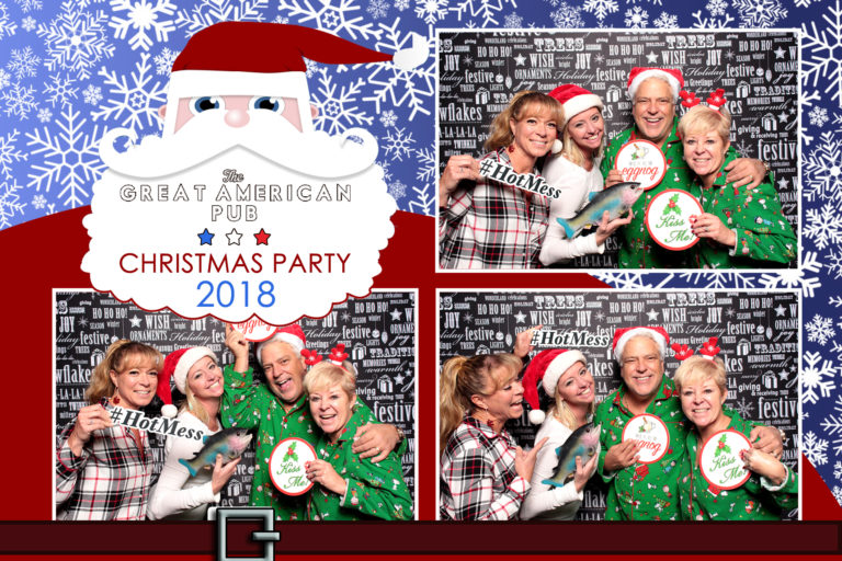 4x6 photo strip of group with christmas props posing in front of seasons greetings backdrop