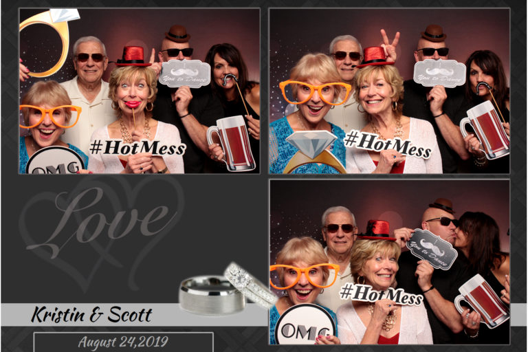 4x6 photo strip of group posing with props in front of backdrop