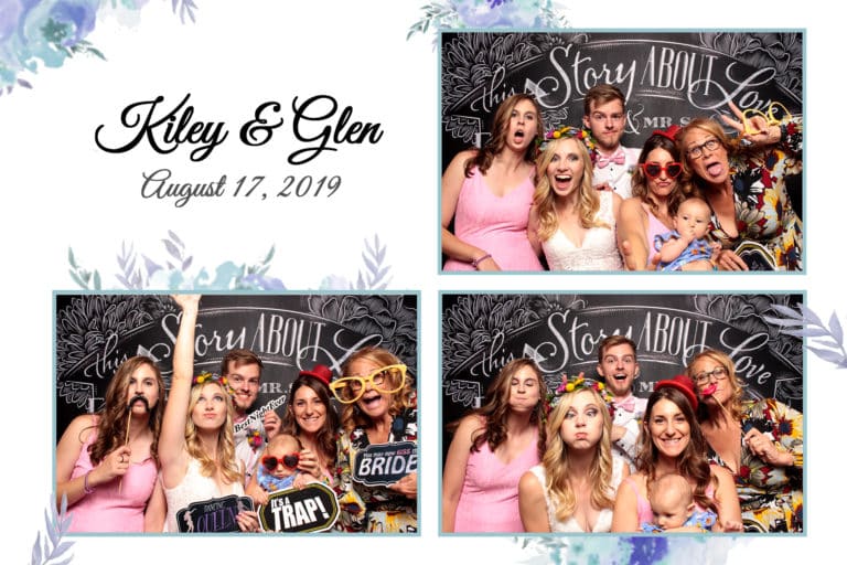4x6 photo strip of group posing in front of chalkboard backdrop