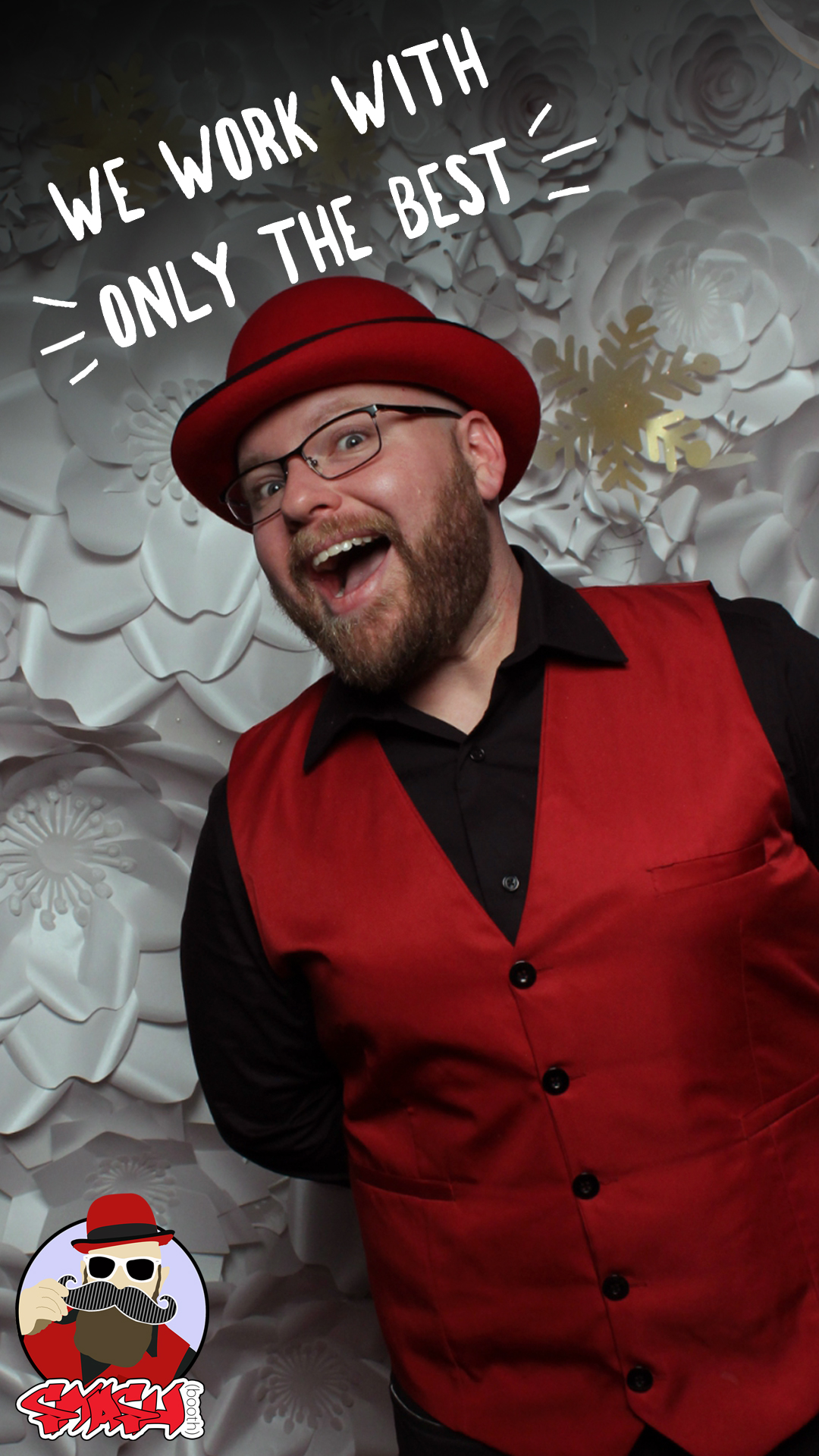 Smashbooth employee in red hat and vest
