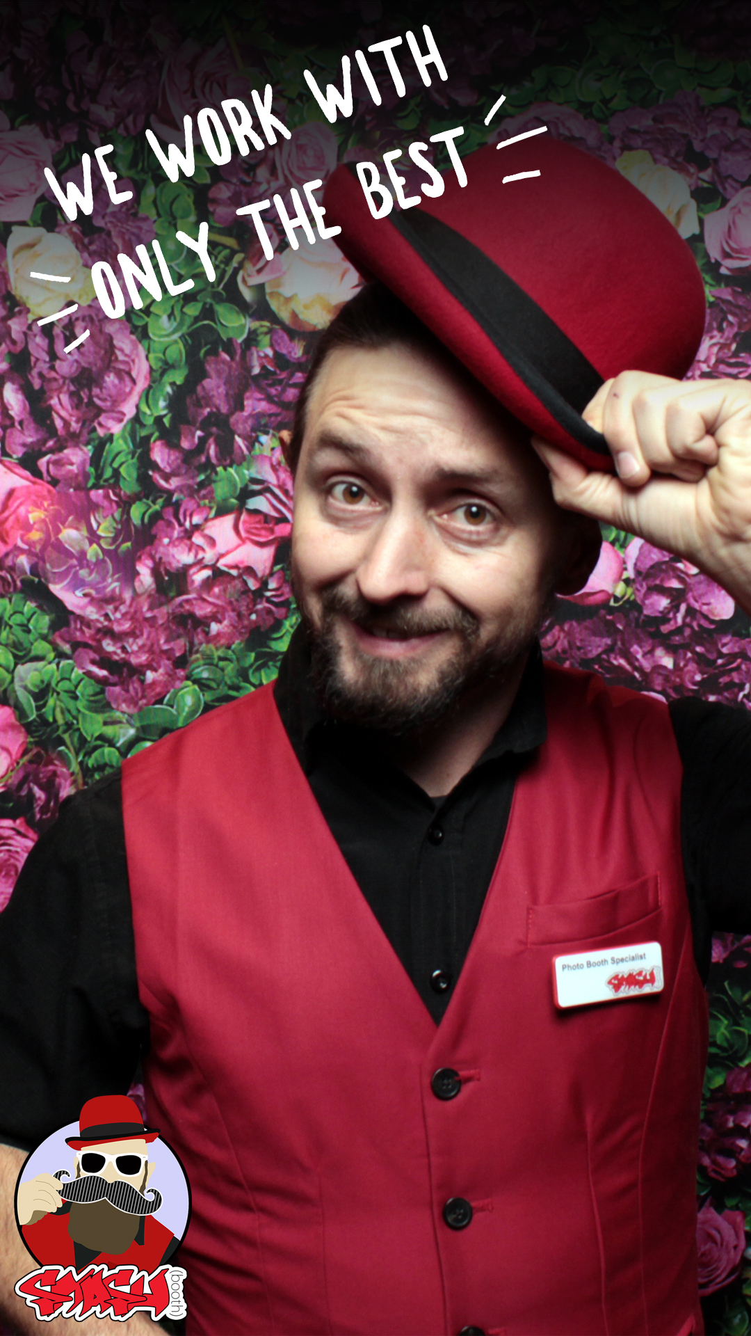 Smashbooth employee with red hat and vest