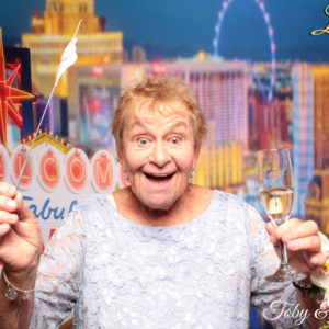 woman posing with Vegas strip backdrop Photo Booth Rentals in Las Vegas Smash Booth