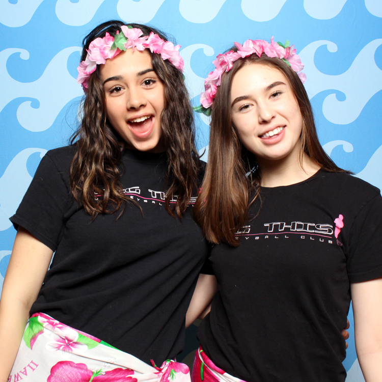 women posing with under the sea backdrop and props