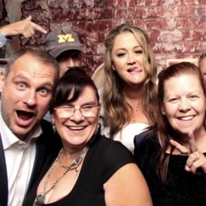 group pose with backdrop Photo Booth Rentals in Las Vegas Smash Booth