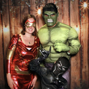 superhero costume pose with wood fence backdrop Photo Booth Rentals in Las Vegas Smash Booth