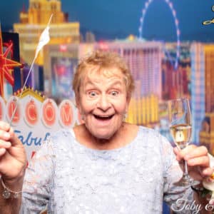 woman posing with Vegas strip backdrop Photo Booth Rentals in Las Vegas Smash Booth