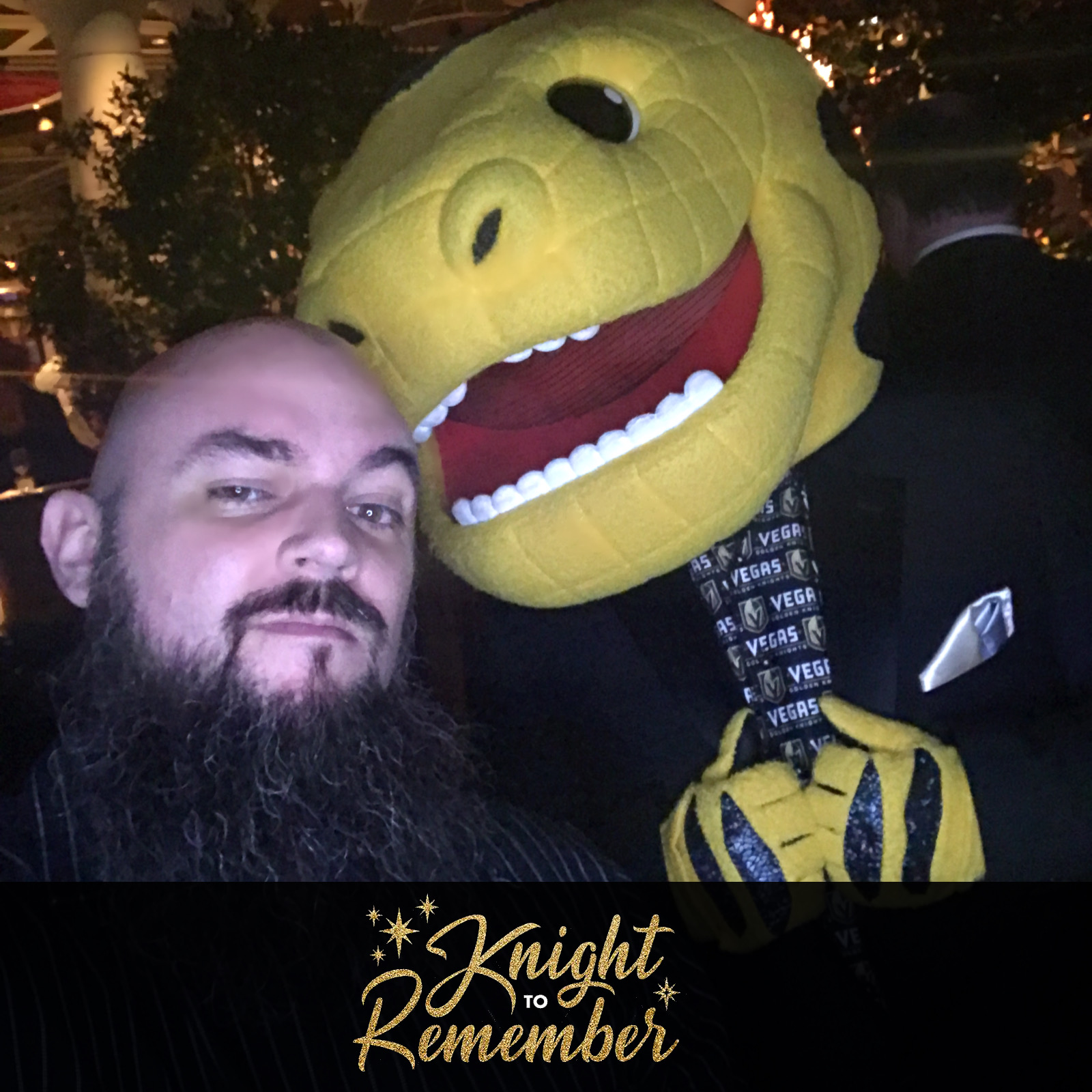 Vegas knights mascot dinosaur with bearded man