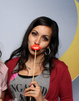 woman-holding-lip-prop-in-photo-booth