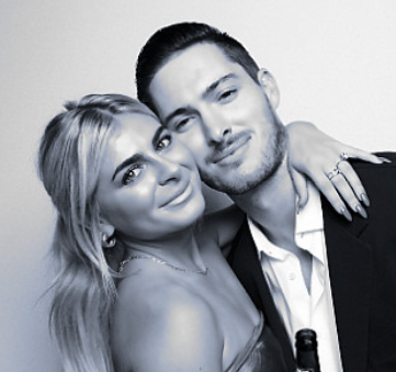 couple-in-formal-attire-smiling-closeup