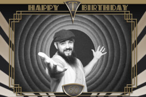 Black-and-white-photo-booth-image-with-vintage-art-deco-‘Happy-Birthday’-template-and-fun-pose