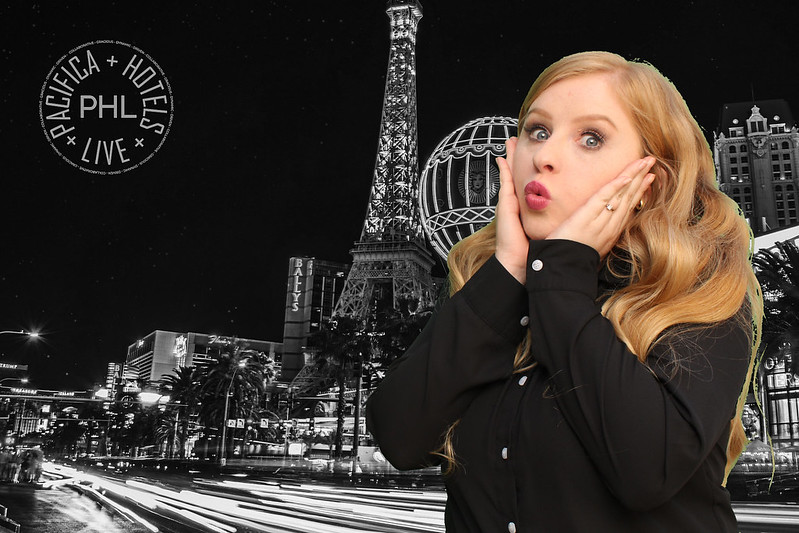 Guest-posing-with-black-and-white-Paris-green-screen-backdrop-at-themed-photo-booth-experience-in-Las-Vegas