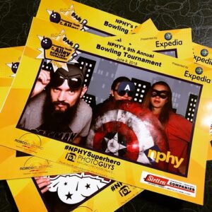 branded-photo-booth-frame-with-guests-posing-using-funny-props-corporate-activation