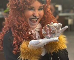 guest-laughing-while-holding-personalized-cookie-with-her-face