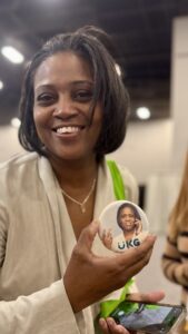 woman-holding-cookie-with-printed-photo