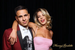couple-posing-together-in-photo-booth