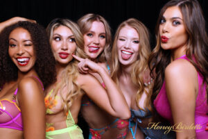 group-of-women-posing-at-bachelorette-or-party-photo-booth
