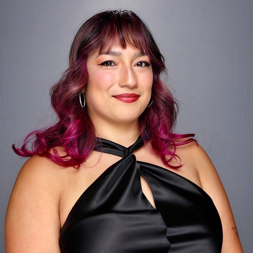 woman-with-red-hair-in-black-halter-dress