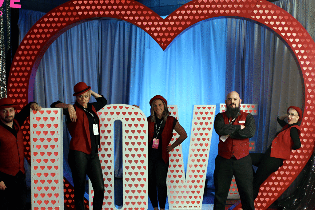 performance-themed-photo-booth-with-guests-posing-in-theatrical-setup