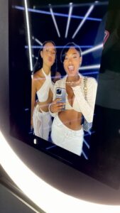 woman-posing-inside-smash-booth-led-tunnel-with-purple-lights