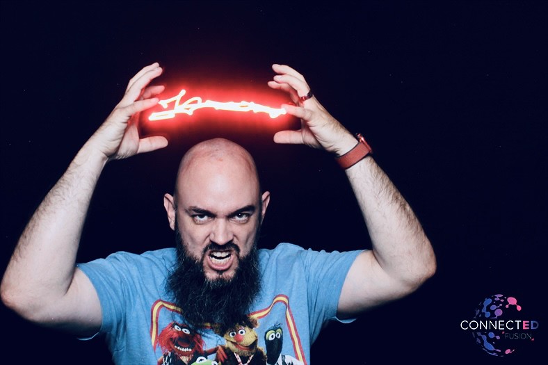 man-holding-red-glowing-light-swirl-in-smash-booth-light-painting-setup