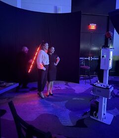 guests-posing-on-light-tunnel-stage-at-smash-booth-activation