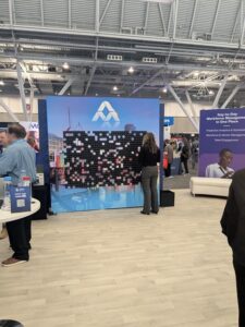 smash-booth-photo-booth-setup-with-underwater-themed-backdrop-and-red-carpet