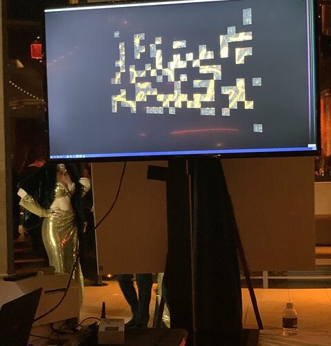 projection-screen-displaying-event-slideshow-at-smash-booth-activation