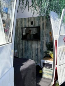 outdoor-photo-booth-inside-white-tent-with-tv-screen