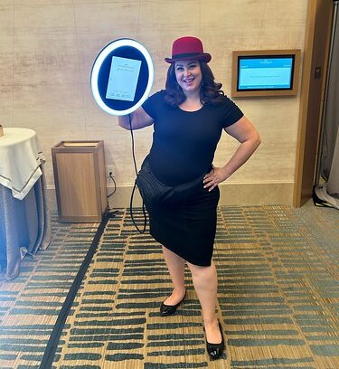 woman-in-red-hat-standing-and-posing-in-hallway
