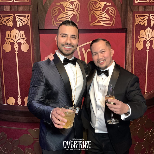 two-men-in-tuxedos-holding-drinks-at-smash-booth-las-vegas-event