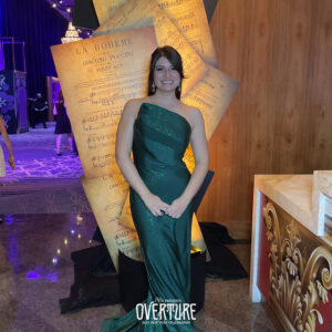 woman-in-teal-dress-posing-at-smash-booth-las-vegas-photo-booth-backdrop