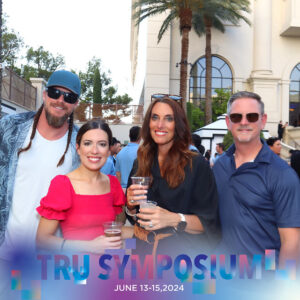 group-of-friends-enjoying-tropical-backdrop-at-smash-booth-las-vegas-outdoor-event