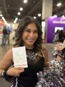 two-women-holding-custom-caricature-cards-at-event