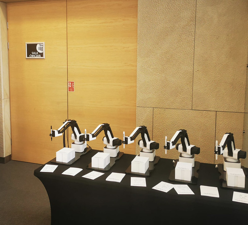 sketch-booth-machines-are-filed-on-a-table-in-an-event-place