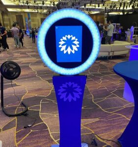 Custom-photo-booth-kiosk-featuring-Las-Vegas-themed-ring-light-and-digital-display
