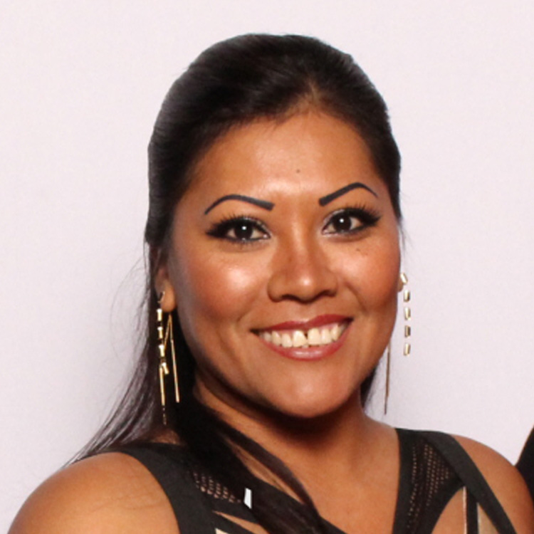 woman-smiling-in-gold-earrings-at-smash-booth-las-vegas-event