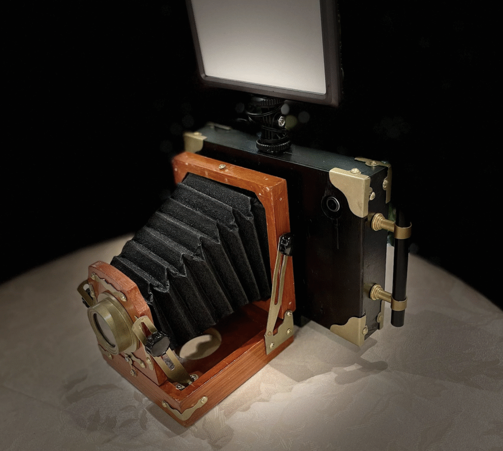 close-up-of-vintage-bellows-camera-on-display