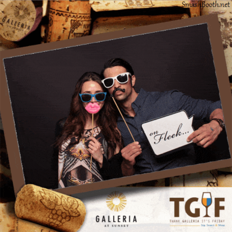 couple-holding-wedding-photo-booth-signs